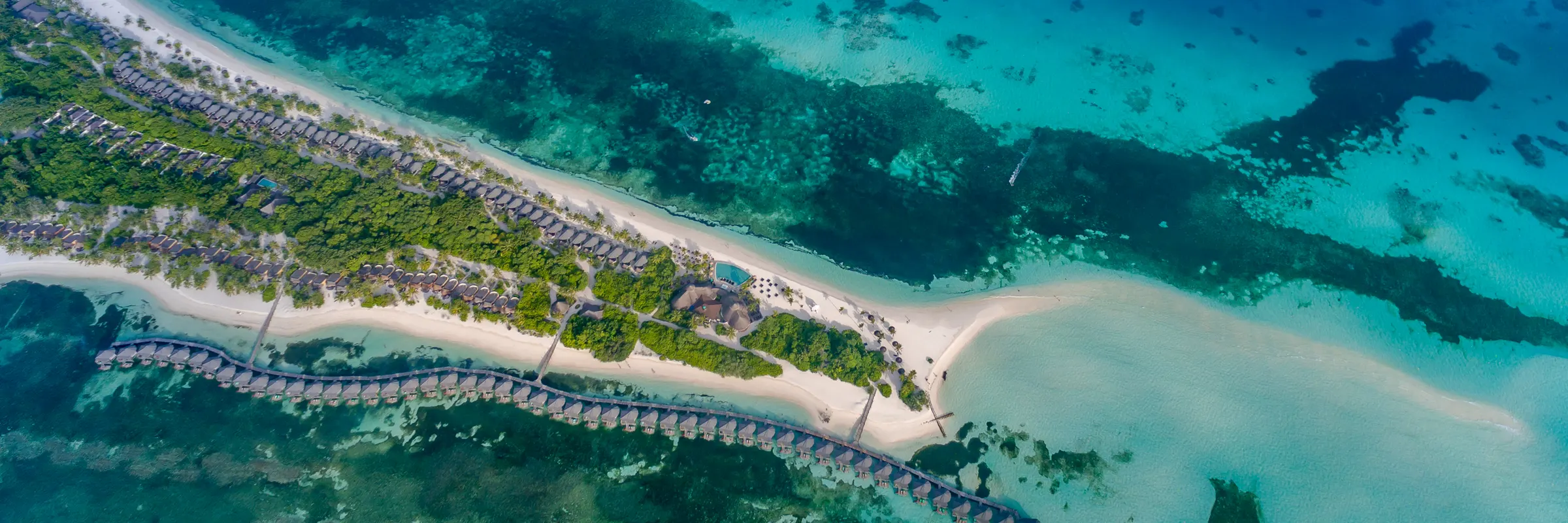 Maldives: A resort island in Lhaviyani Atoll, with its villas over the lagoon